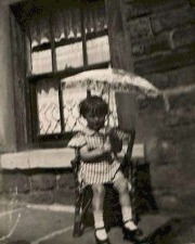 Barbara, two years old with a parasol