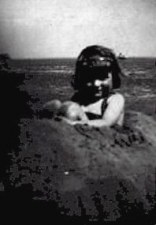 Barbara at the beach at the age of three