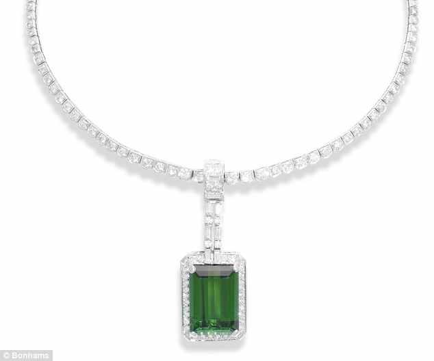 Green tourmaline and diamond pendant, matching the ring, also by Tambetti: Estimated: £6,800 – £7,200