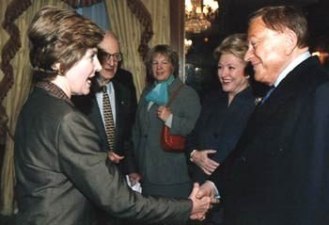 Robert Bradford and Barbara Taylor Bradford greet US First Lady Laura Bush at a New York event for the Police Athletic League, a charity for underprivileged children in New York City