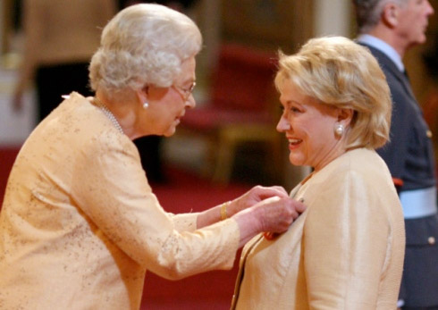 Barbara gets her OBE from Queen Elizabeth II